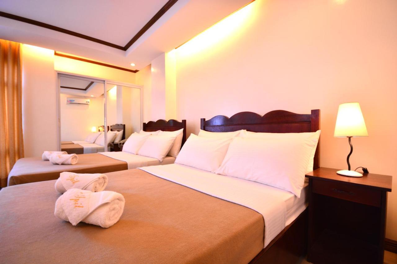Ipil Suites Puerto Princesa Extérieur photo